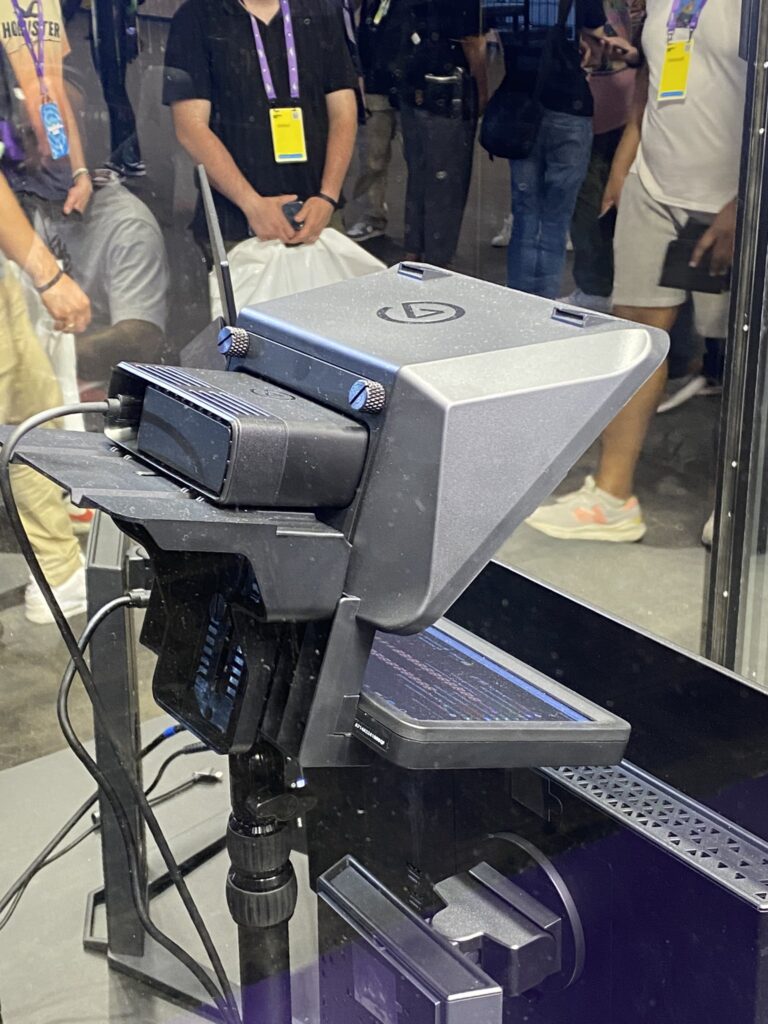 Photo of an Elgato-branded teleprompter mounted on an Elgato Multi-Mount with some sort of monitor and Elgato Facecam bundled together.